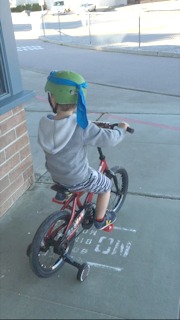 hudson on bike